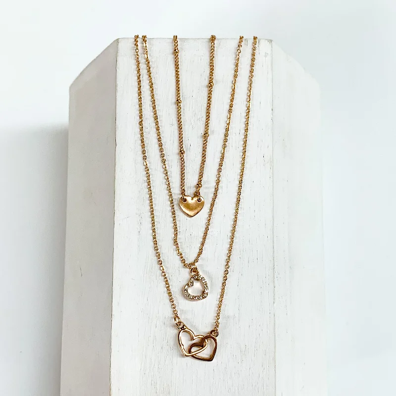 Multi Layered Necklace with Heart Pendants in Gold Tone